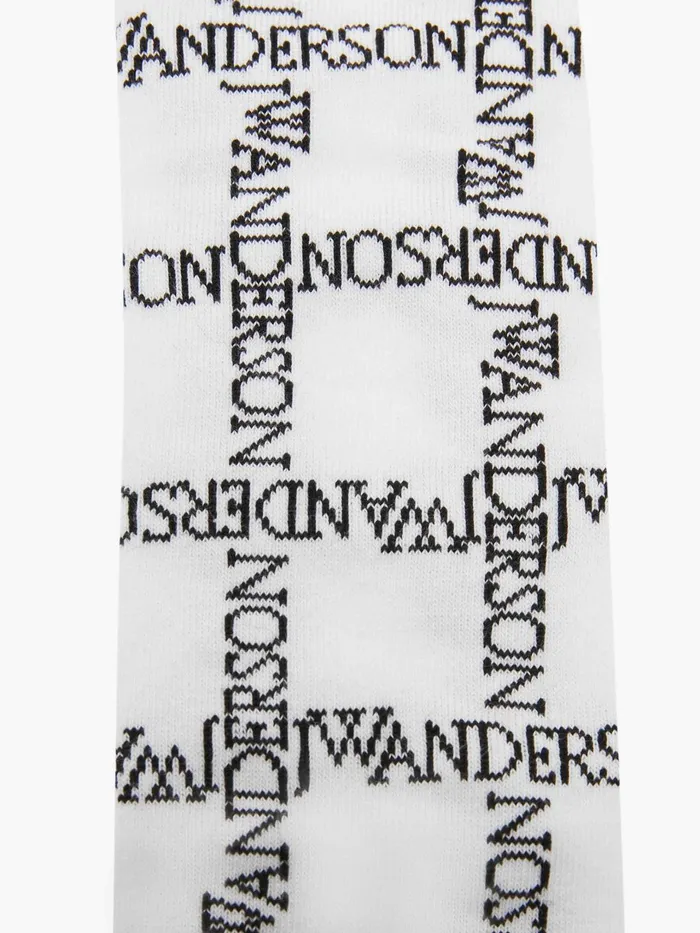 Men OTHER ACCESSORIES JW Anderson LONG SOCKS WITH LOGO GRID Whiteblack Men OTHER ACCESSORIES JW Anderson LONG SOCKS WITH LOGO GRID Whiteblack