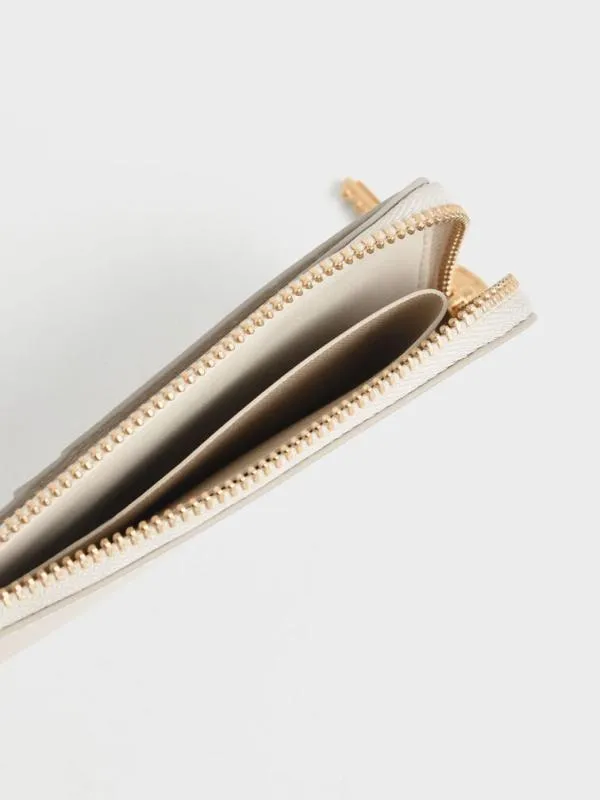 Women Lane Key ZipAround Wallet 8211 Cream CHARLES and KEITH Small Wallets Women Lane Key ZipAround Wallet 8211 Cream CHARLES and KEITH Small Wallets